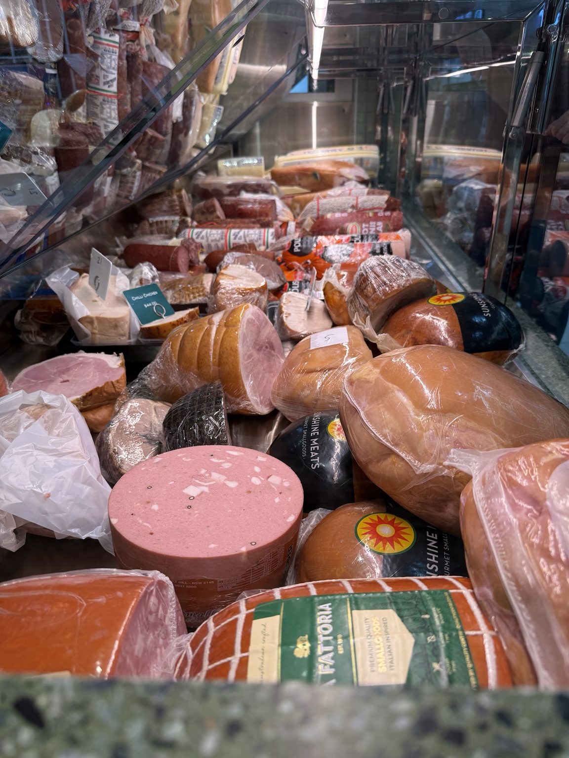 Selection of ham, mortadella and salami in the DeliCut cabinet